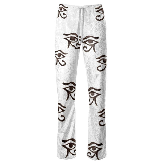 Ladies trousers in Velour fabric,  front white back ground and bold the Eye of Horus in black.